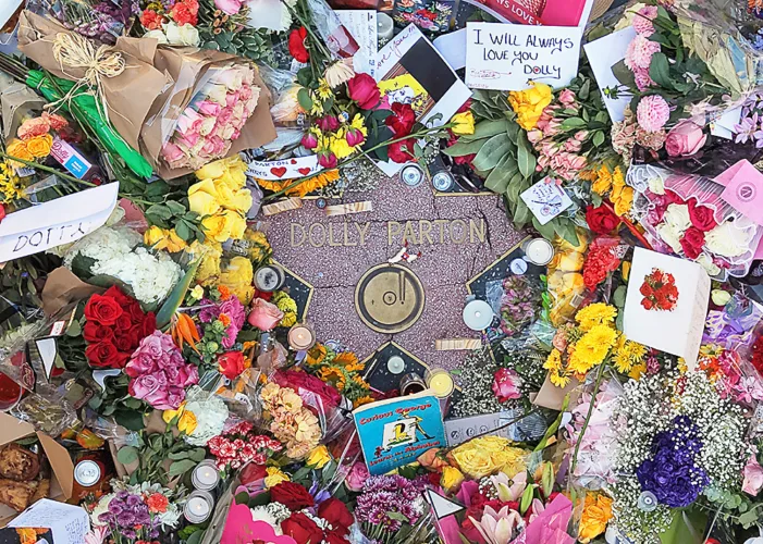 To Dolly Parton, God and acceptance shared stage